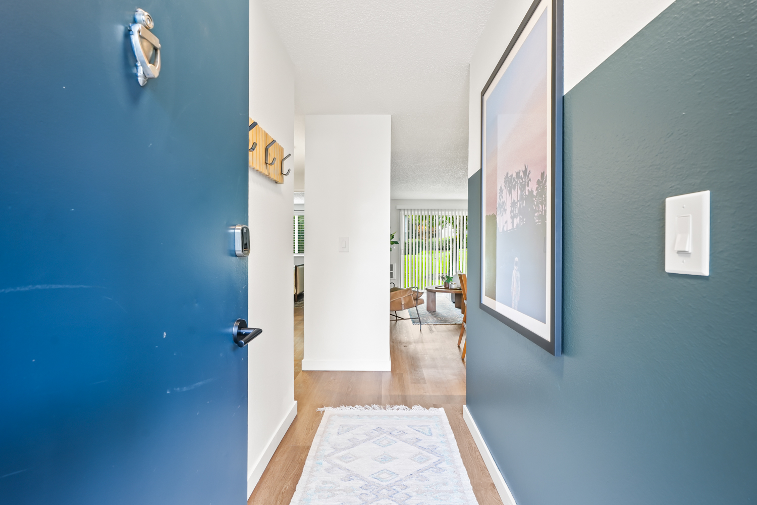 Entryway with blue accent wall